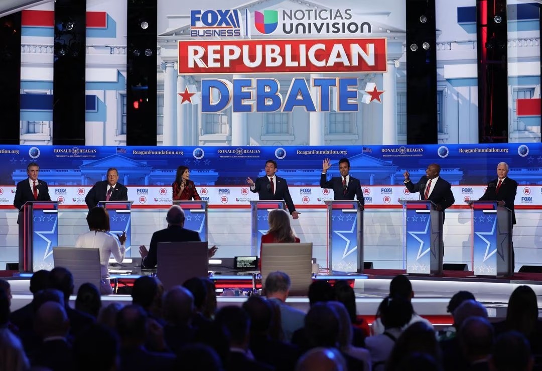 Republican debate candidates turn on one another in absence of frontrunner Trump